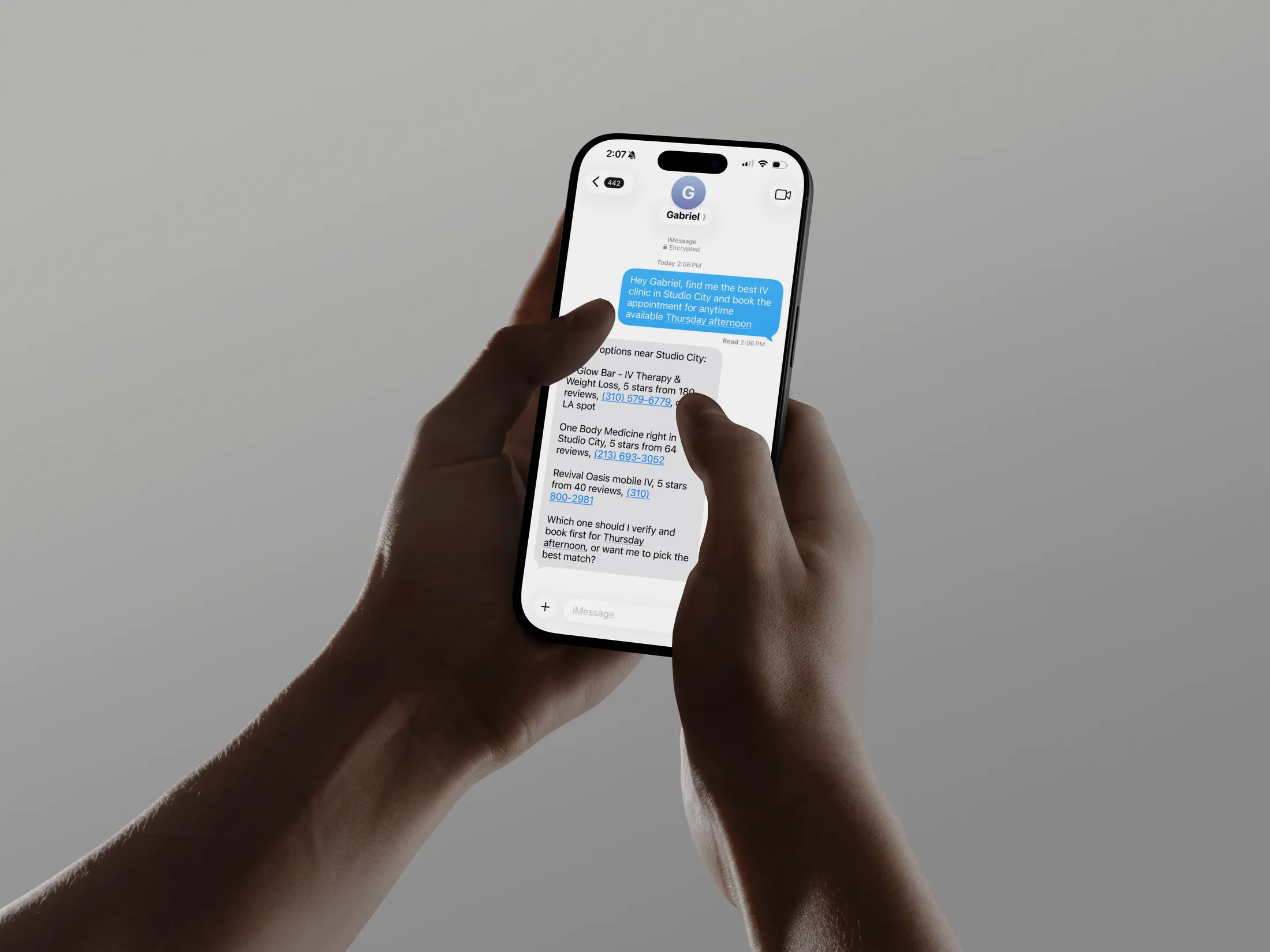 A realistic iPhone held in two hands showing a Gabriel care coordination text conversation.